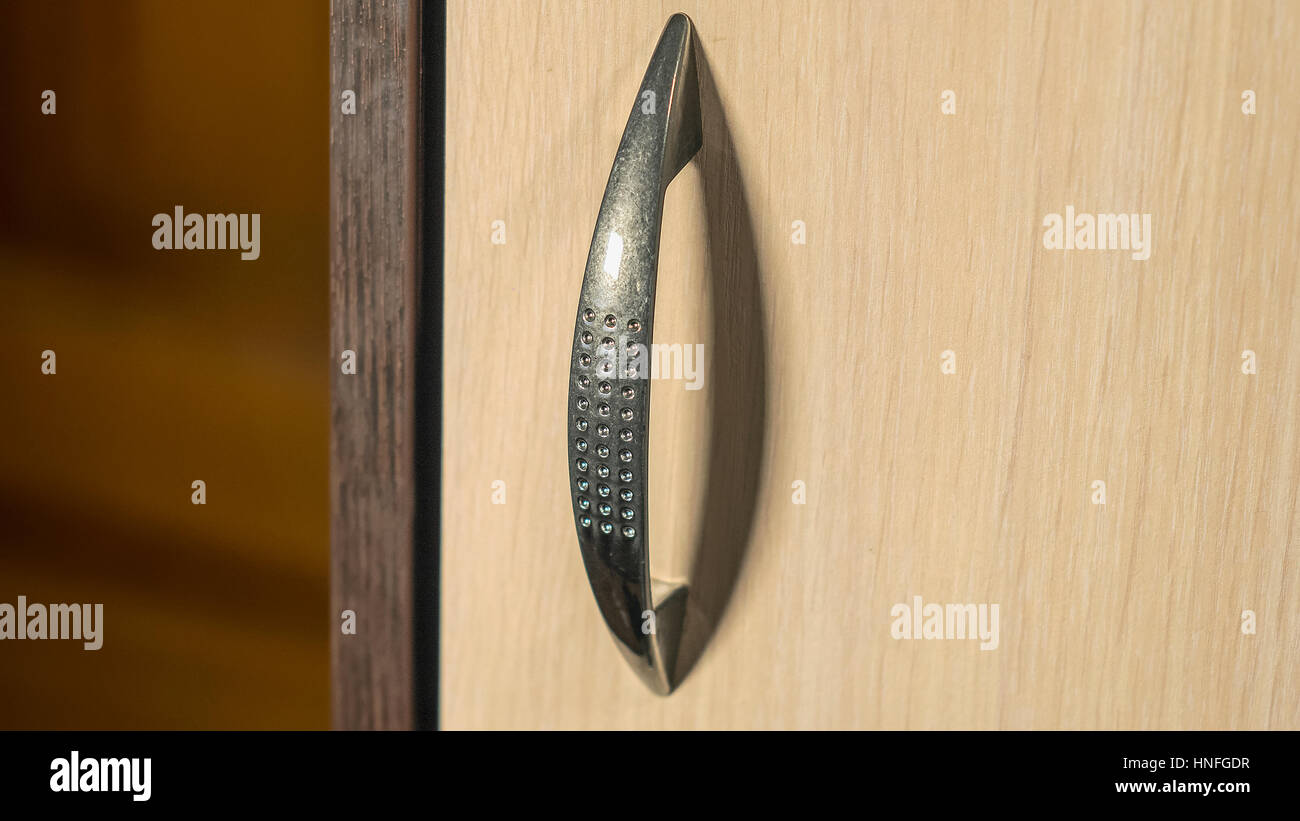 The beautiful and brilliant elegancy steel cabinet handle Stock Photo ...