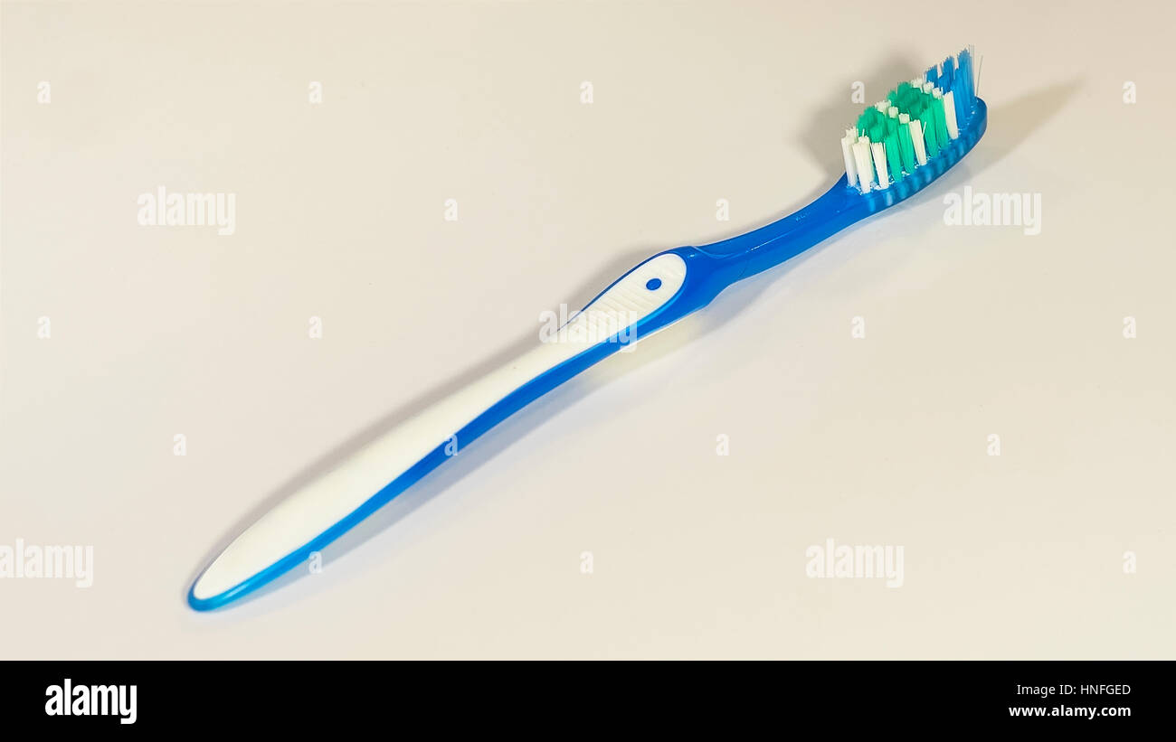 The toothbrush isolated on the white background Stock Photo - Alamy