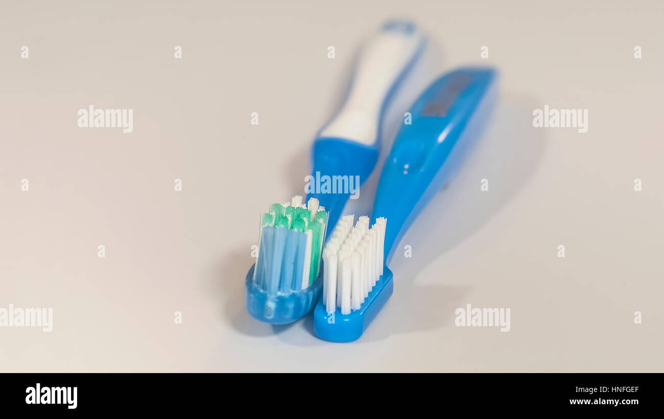 Two toothbrushes isolated on the white background Stock Photo - Alamy