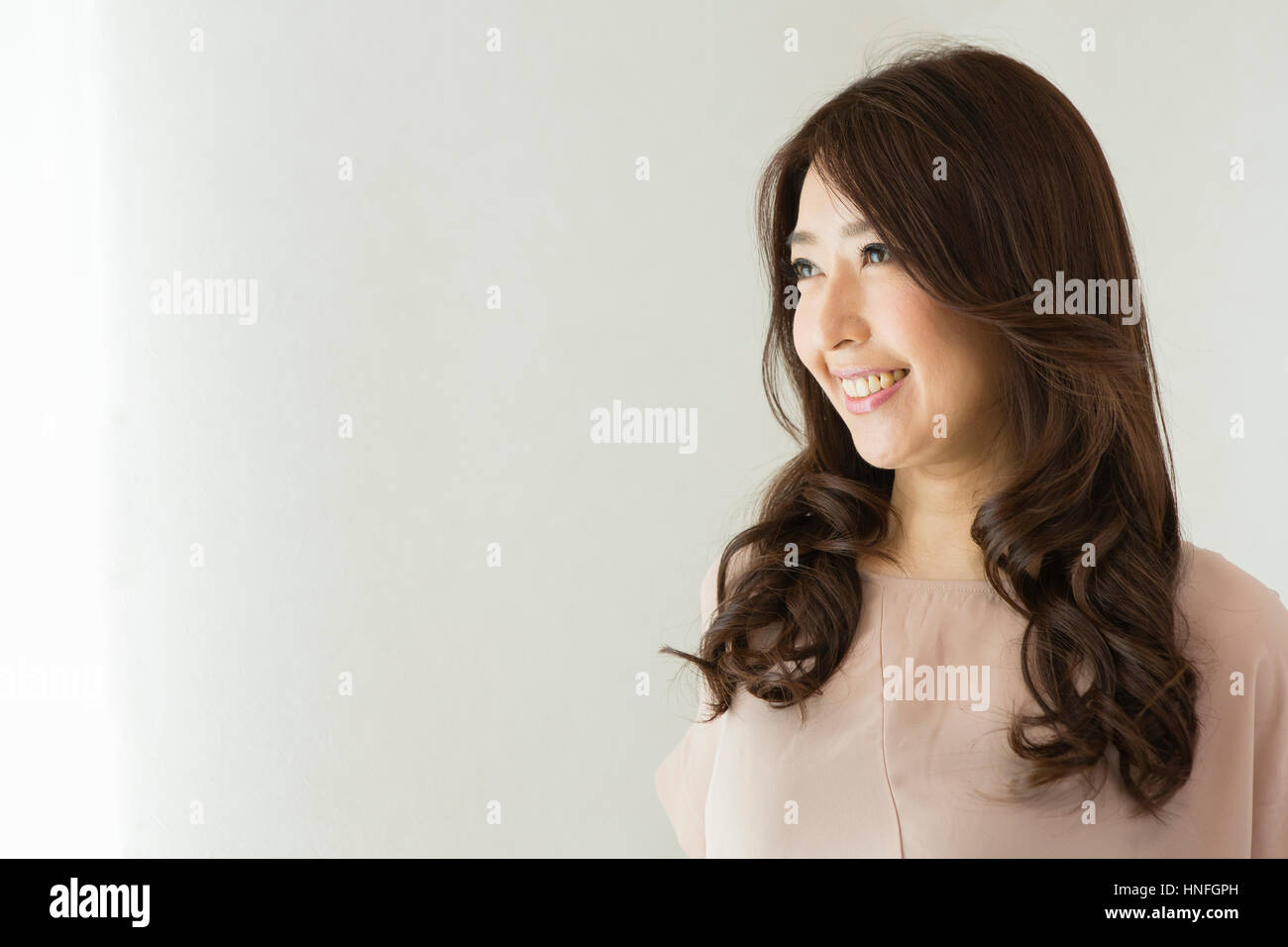Woman face asian mature one 40s hi-res stock photography and images - Alamy
