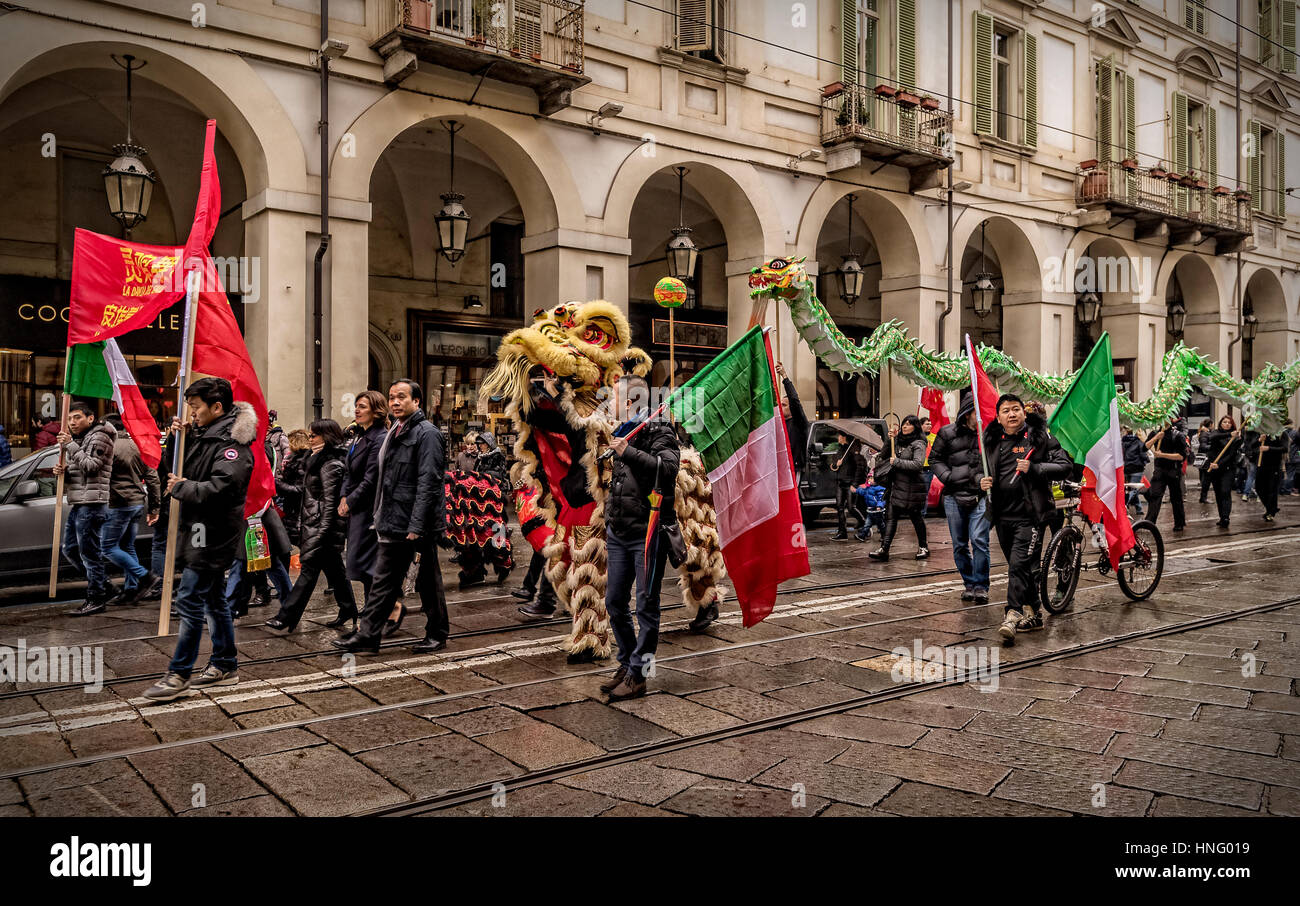Turin, Italy. 12th February 2017. Celebrations for the Chinese New Year, also known as the Lunar New Year or Spring Festival and Dragon Dance - 2017 Year of the rooster - Parade Credit: Realy Easy Star/Alamy Live News Stock Photo