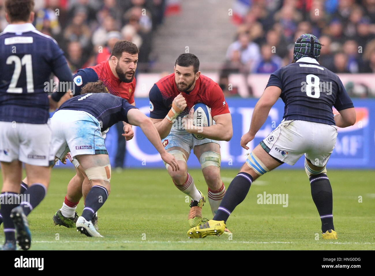 Paris, France. 12th February 2017. HSBC 6 Nations Rugby tournament, France versus Scotland;  Loann Goujon (fra)runs into tackle of Allan Dell and Josh Strausse Credit: Action Plus Sports Images/Alamy Live News Stock Photo