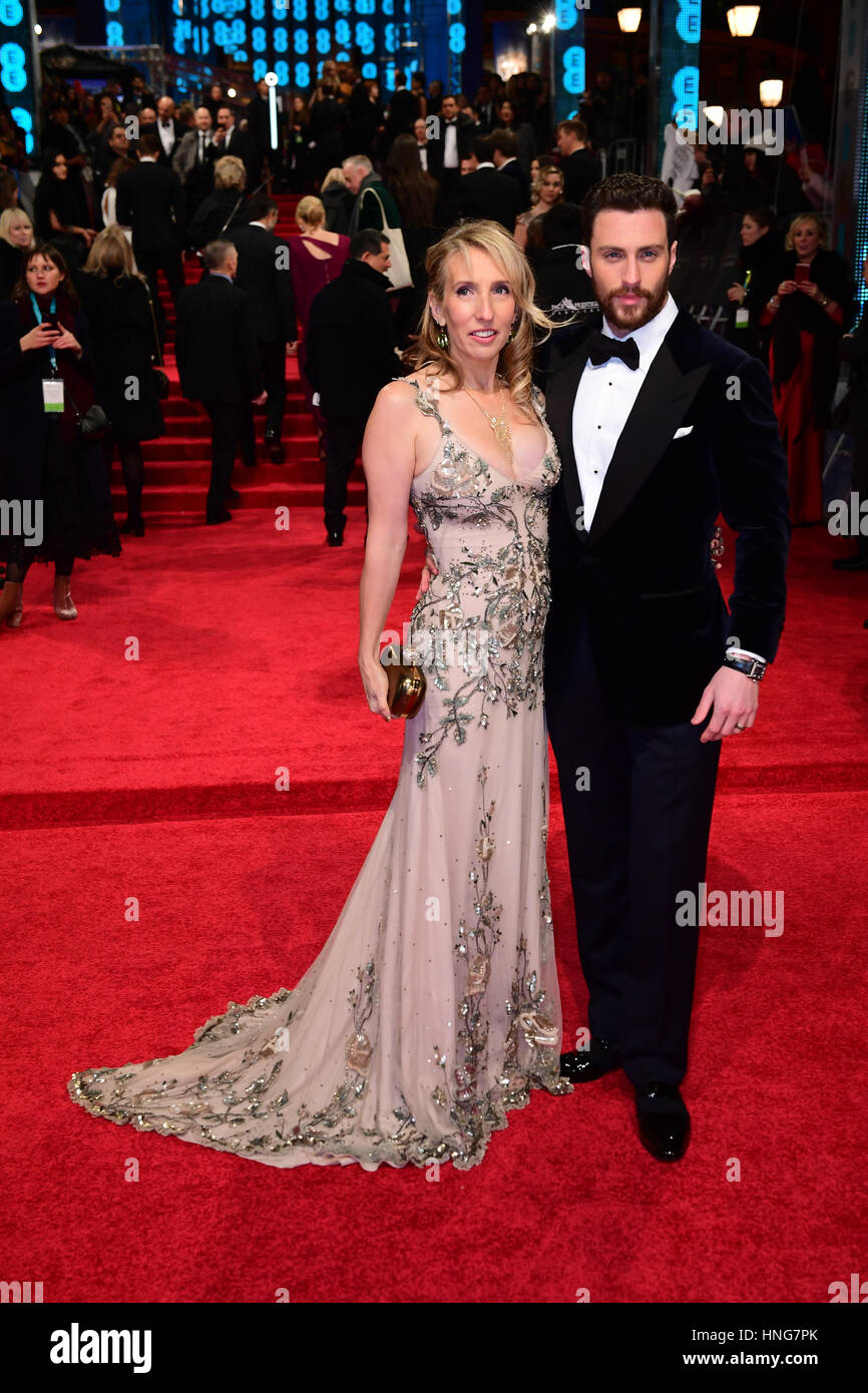 Sam Taylor-Johnson and Aaron Taylor-Johnson attending the EE British Academy Film Awards held at the Royal Albert Hall, Kensington Gore, Kensington, London. PRESS ASSOCIATION Photo. Picture date: Sunday 12 February 2017. See PA Story SHOWBIZ Bafta. Photo credit should read: Ian West/PA Wire Stock Photo