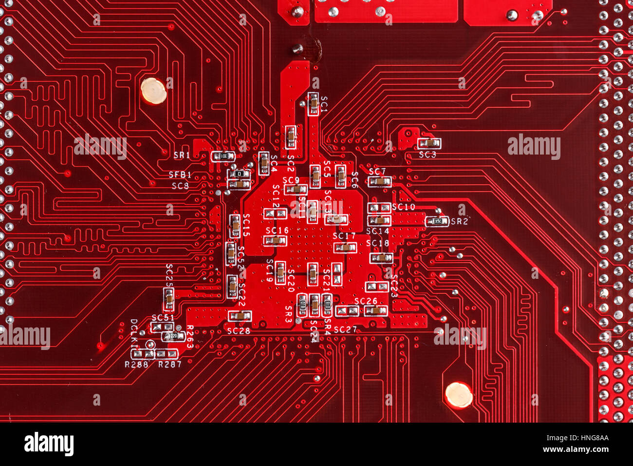 Red electric circuit board background of computer motherboard Stock Photo -  Alamy