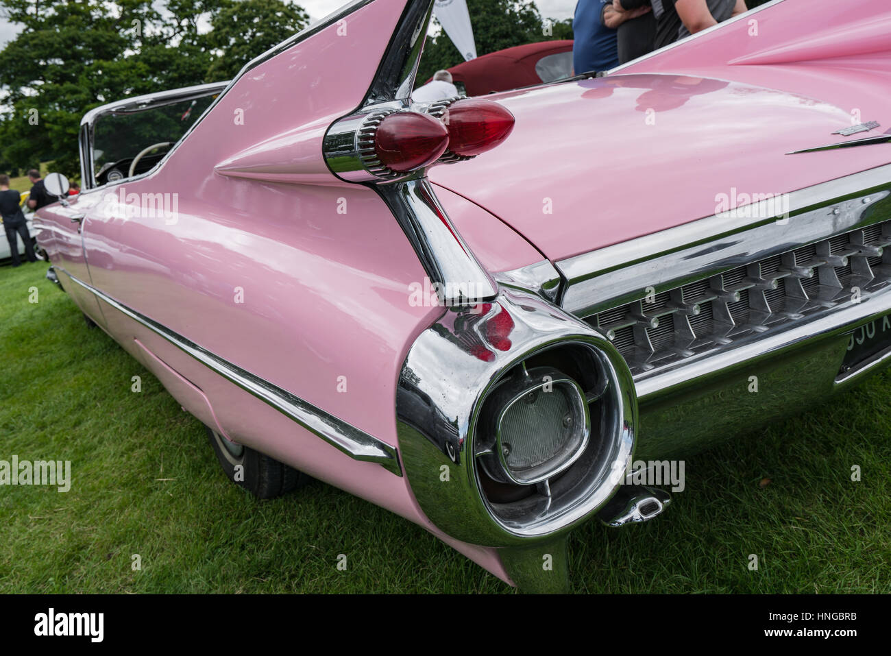 Elaborate wings on a pink 1959 Cadillac Eldorado at the Bodelwyddan Classic Car Show Stock Photo