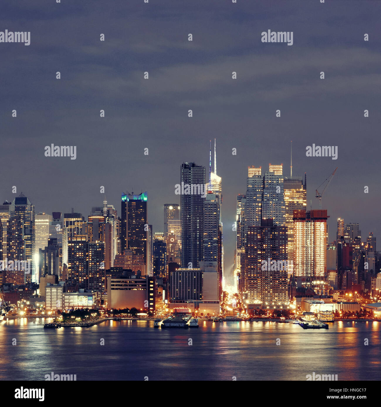 Manhattan midtown skyscrapers and New York City skyline at night Stock ...