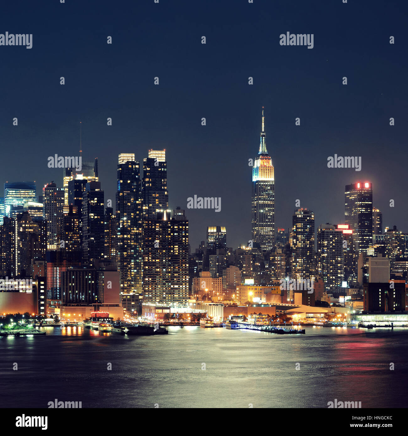 NEW YORK CITY, NY - JUL 11: Empire State Building at night on July 11, 2014 in New York City. It is a 102-story landmark and was world's tallest build Stock Photo