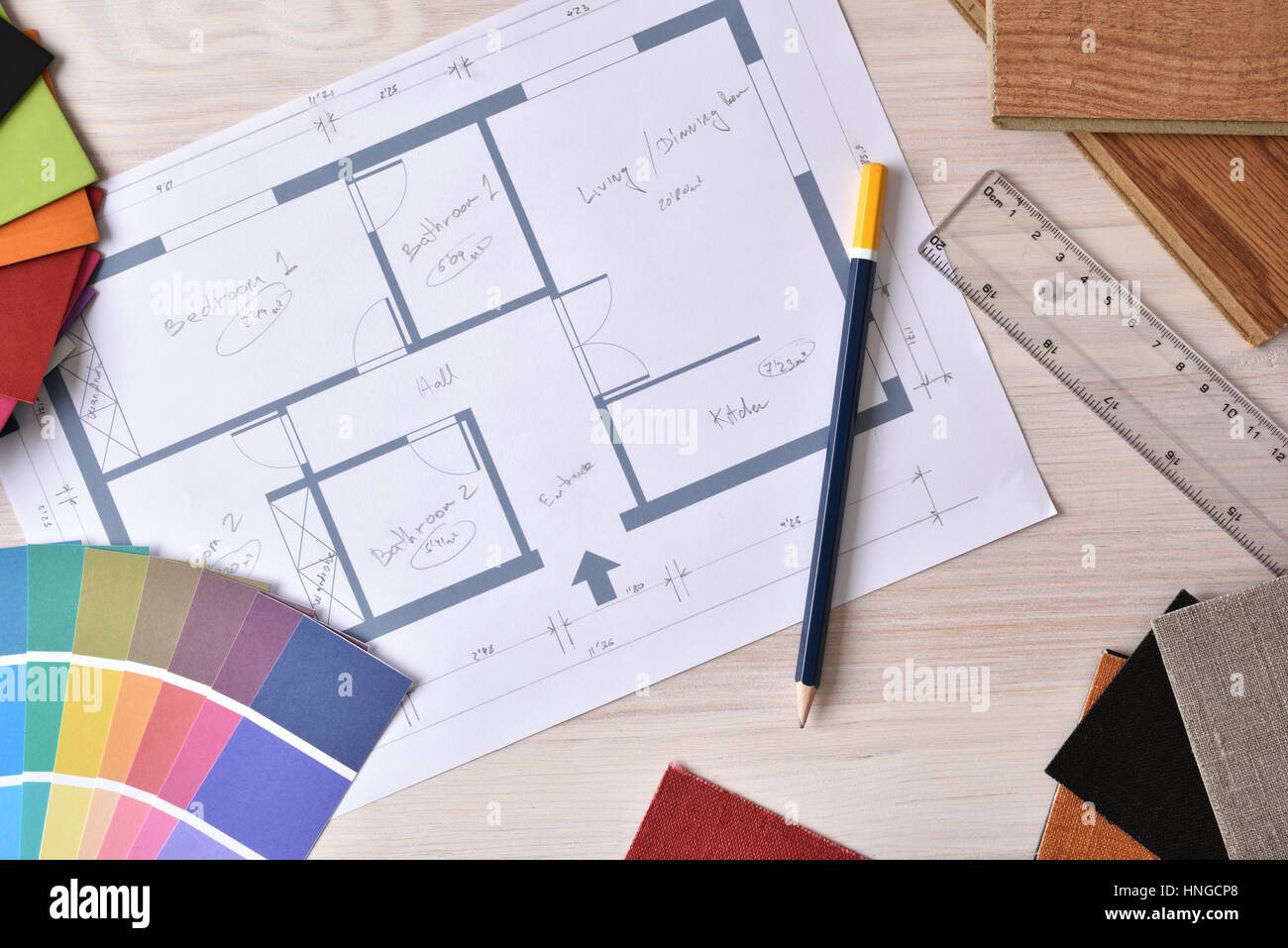 Designer and decorator workbench with interior plan of home tools and ...