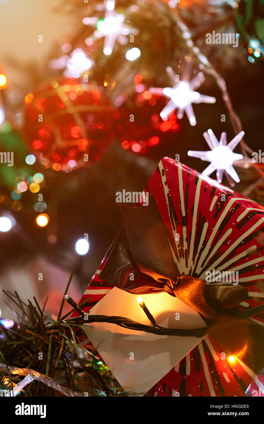 Close up of christmas gift on christmas light and toys background Stock Photo