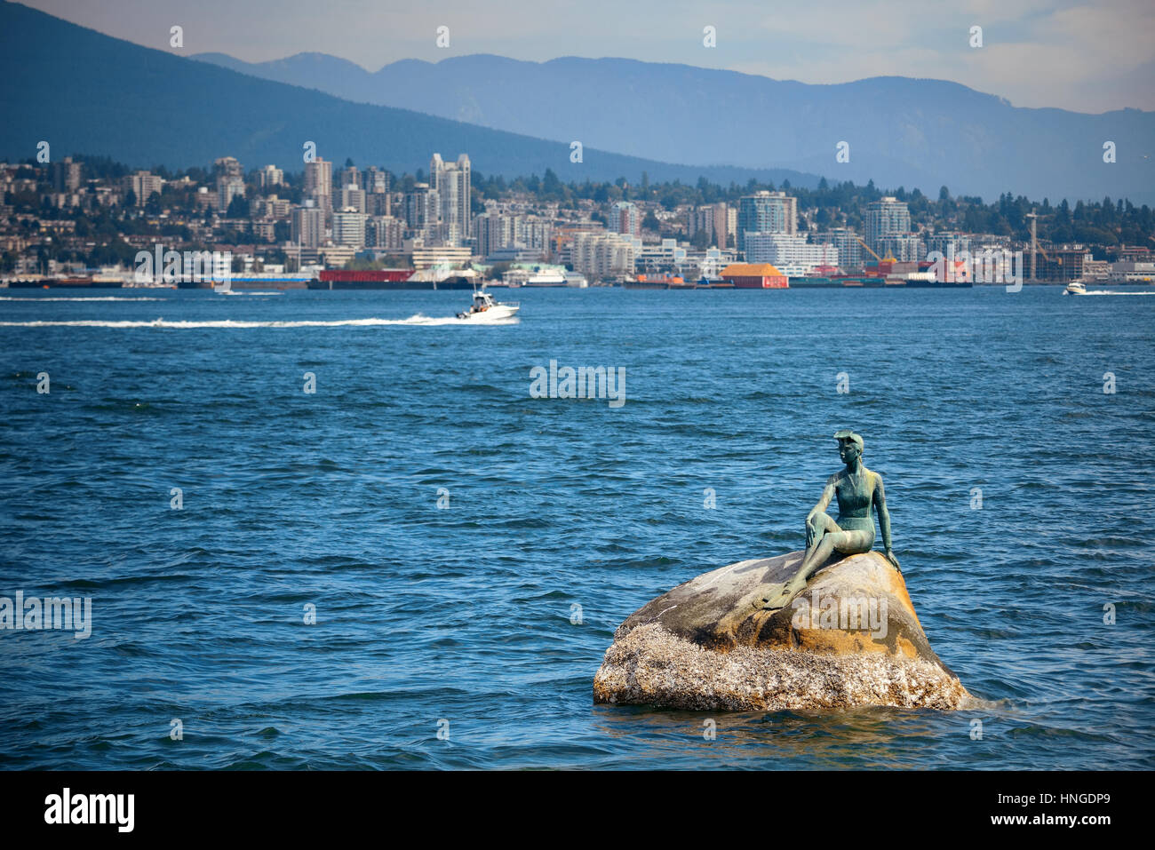 Girl in a Wetsuit sculpture in sea in Vancouver, Canada Stock Photo Alamy