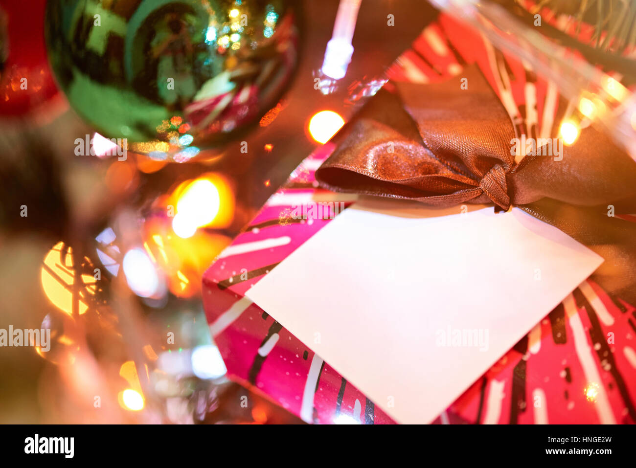 colorful new present box under christmas tree with blur background Stock Photo