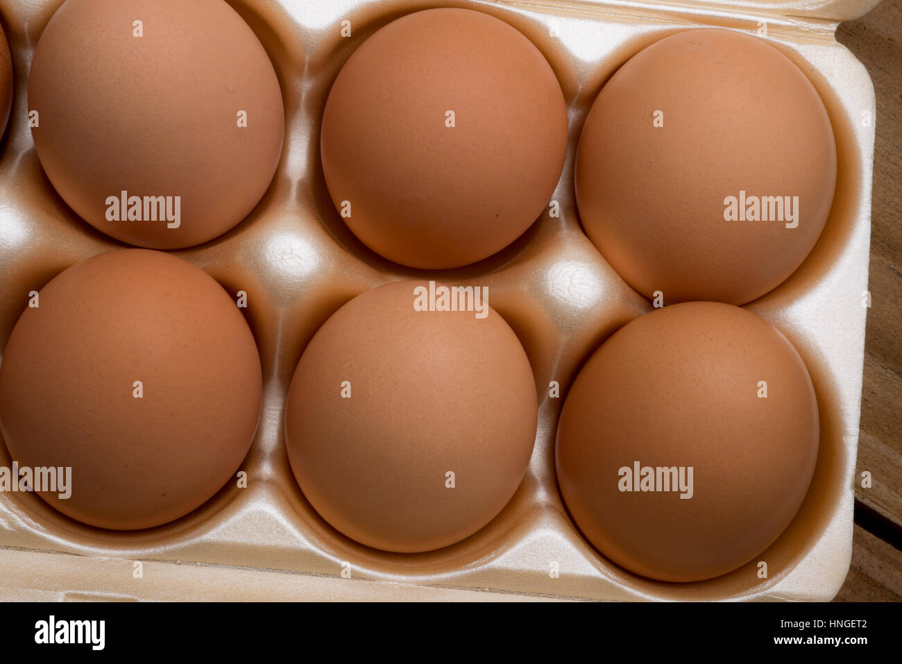 brown chicken eggs in a carton Stock Photo