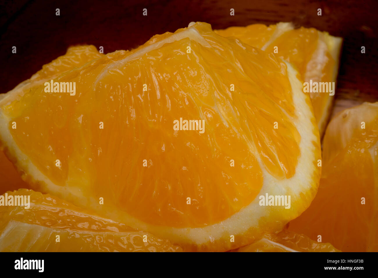 sliced chunks of sweet orange Stock Photo