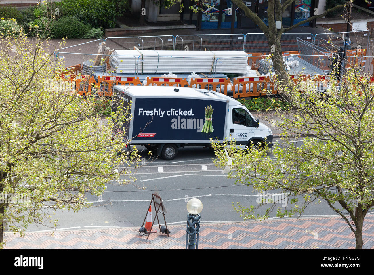 A Tesco grocery delivery van on the road in Birmingham UK Stock Photo