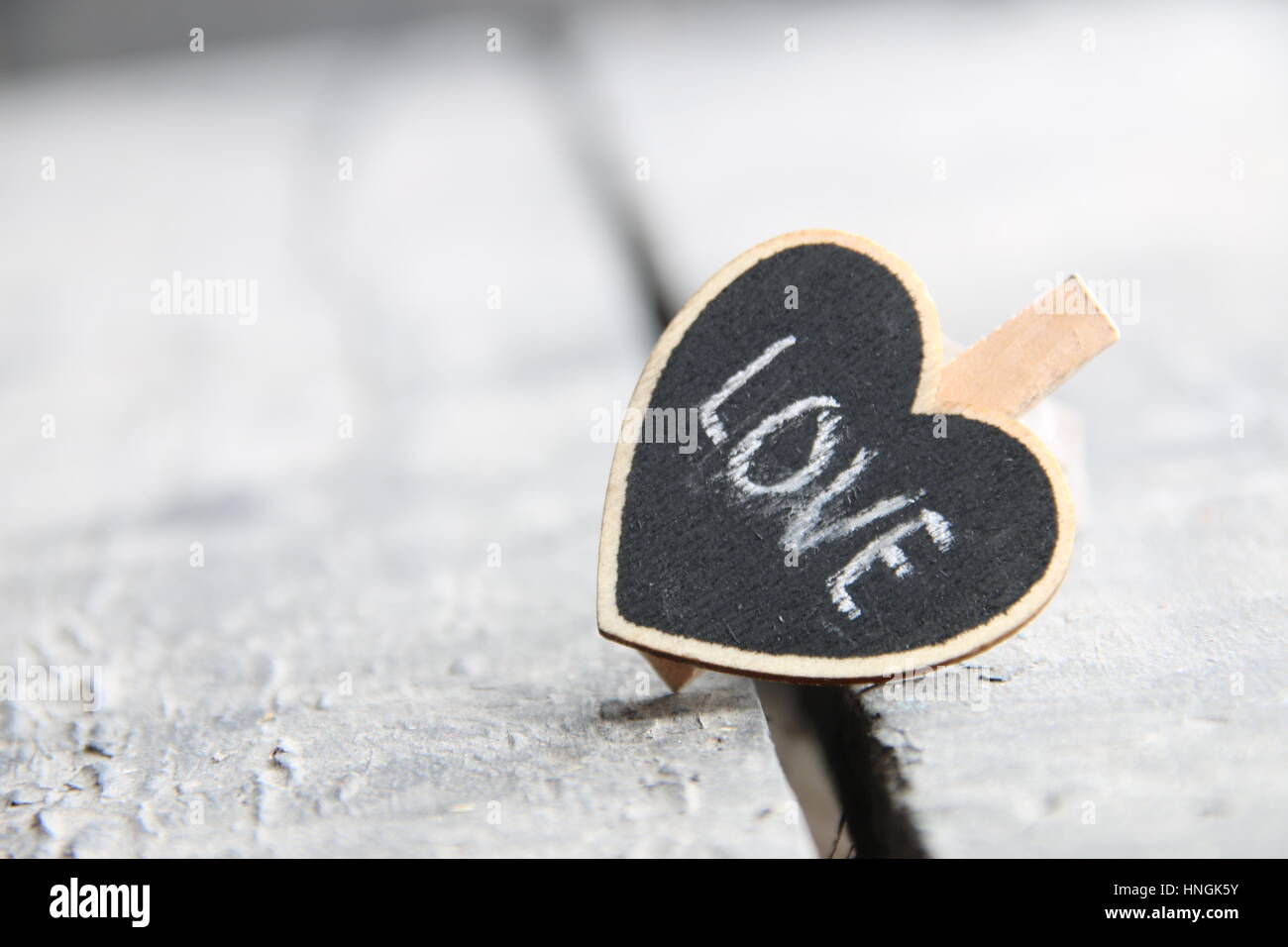 St Valentine's day greeting card with heart, blurred photo for background Stock Photo