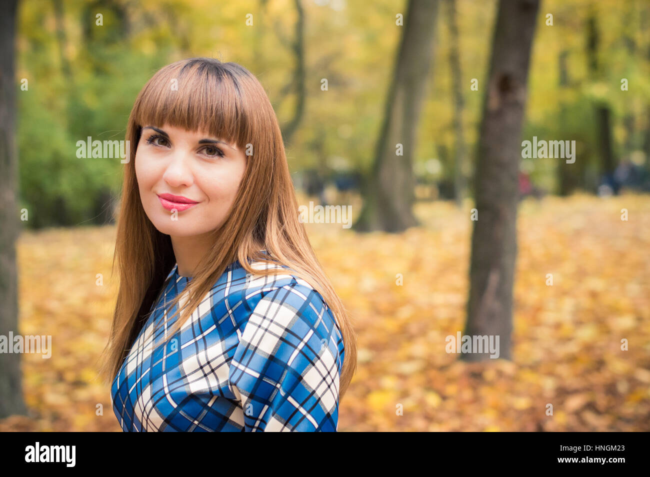 beautiful girl in park autumn Stock Photo - Alamy