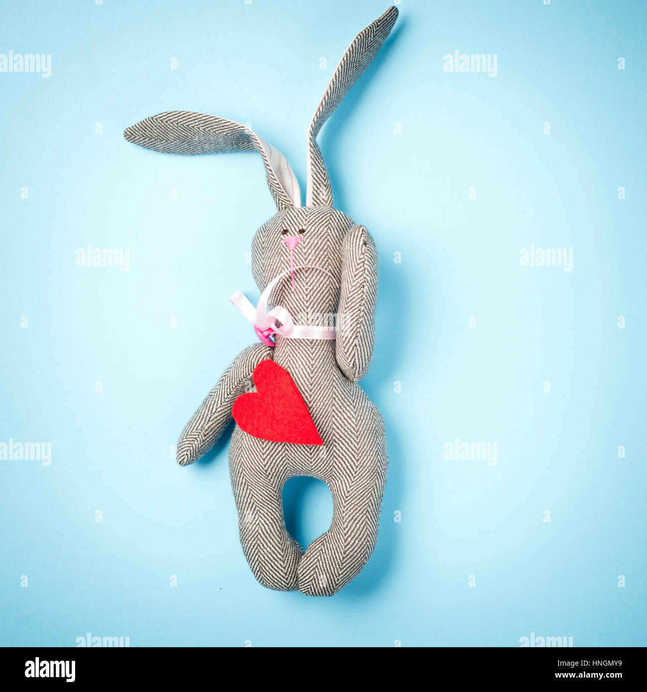 Easter bunny on a blue background Stock Photo - Alamy