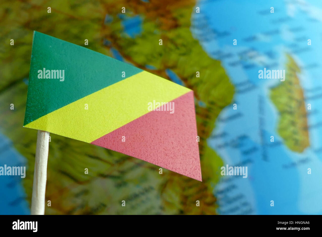 Republic of Congo flag with a globe map as a background macro Stock ...