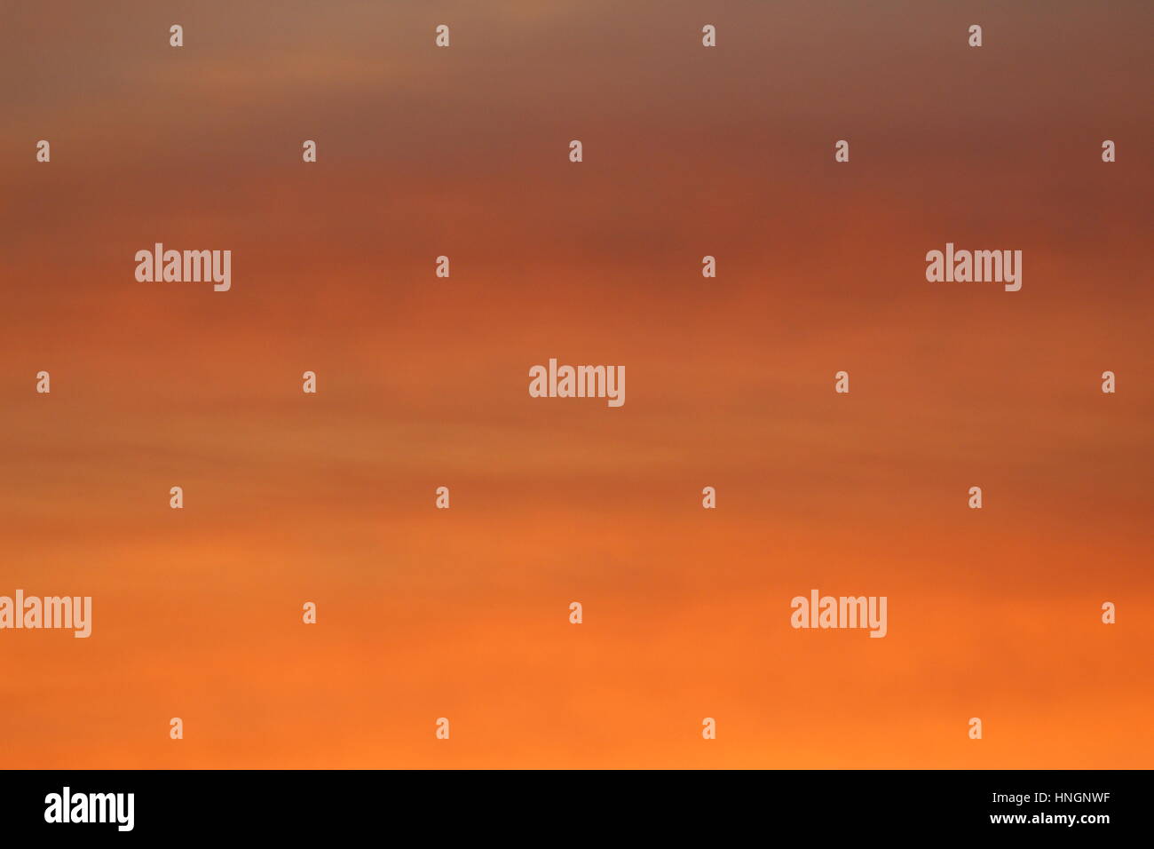 Smooth Orange Sunset or slideshow background Stock Photo