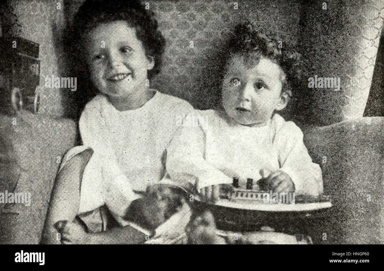 Orphaned by the wreck - When the Carpathia reached New York, these two little French children were found in the care of Miss Hayes, a survivor. Their father went down with the Titanic Stock Photo