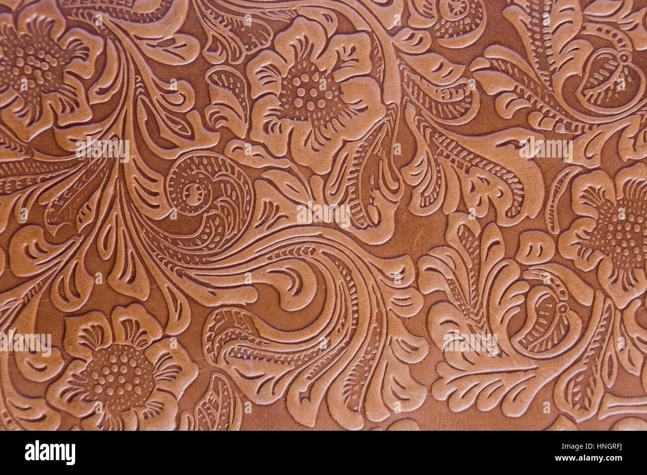 Floral Print Embossed on Leather Book Cover Stock Photo - Alamy