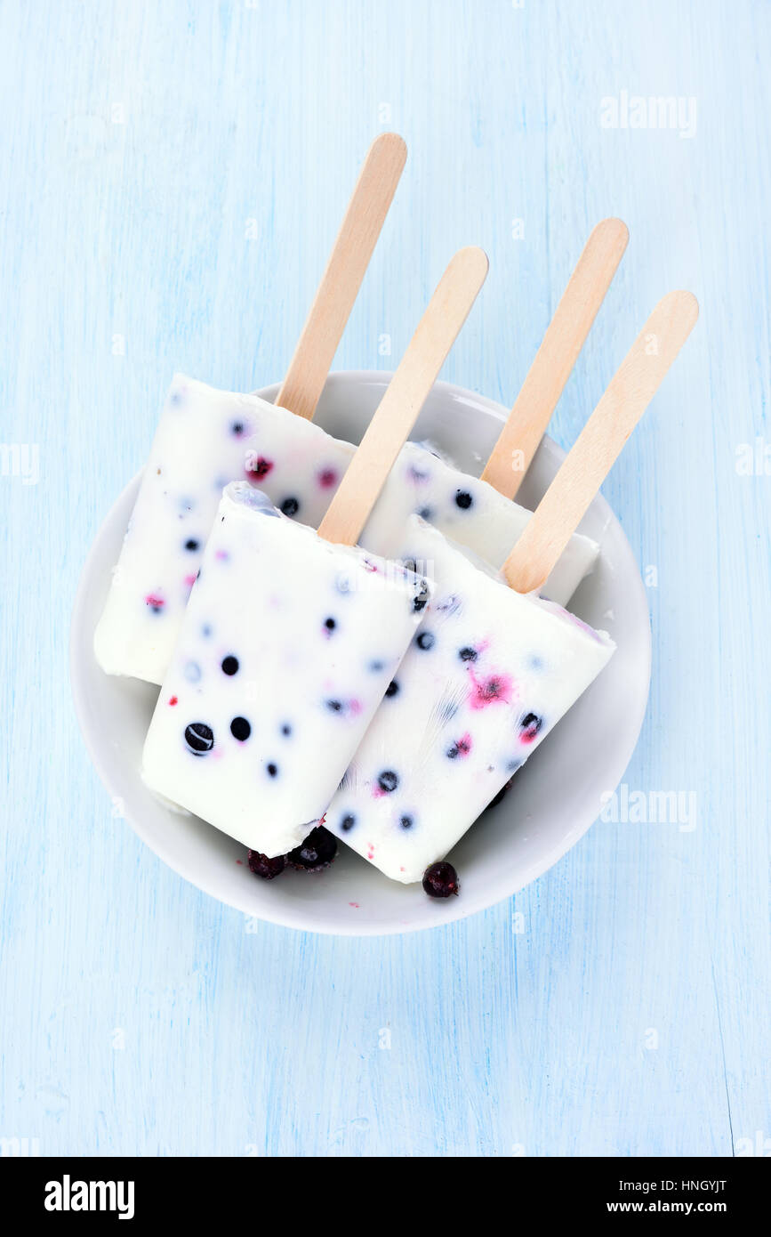 Ice cream, popsicles from yogurt, blueberry and blackcurrant Stock