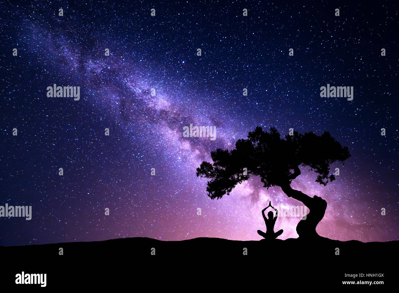 Yoga cosmic space meditation illustration, silhouette of man practicing  outdoors at night Stock Photo - Alamy