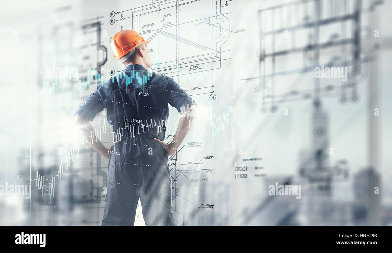 Back view of engineer man looking at virtual panel Stock Photo - Alamy