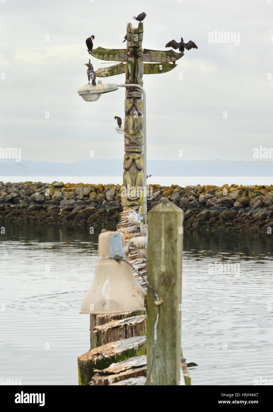 Totem Pole in Des Moines Marina, Washington State USA Stock Photo