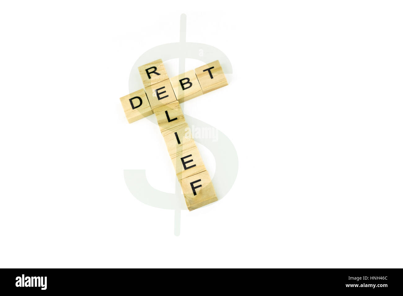 Concept debt reflief spelled out in wood blocks with dollar sign. Stock Photo