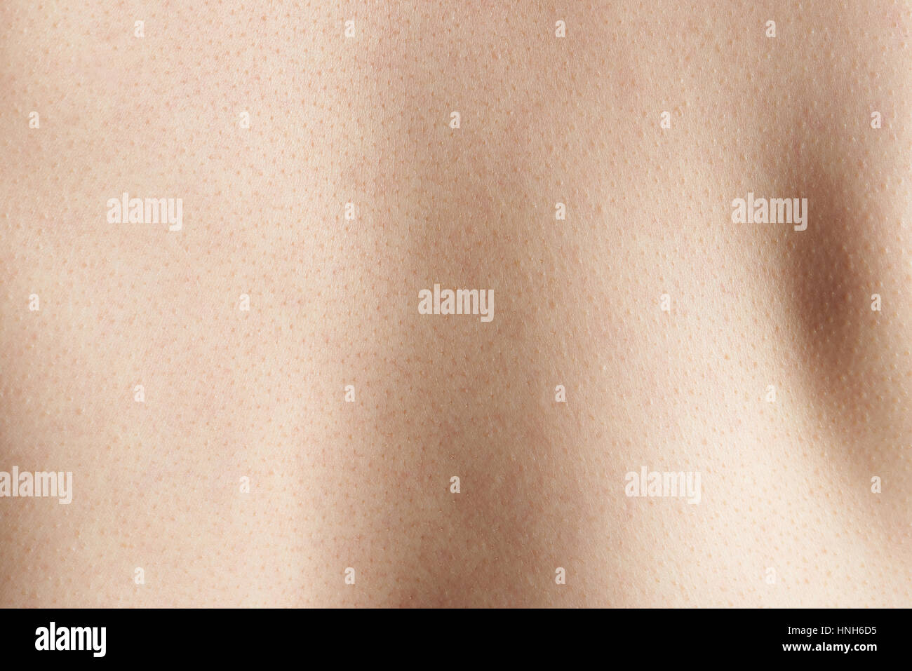 Clean skin texture background of human back. Close up skin on man body Stock Photo