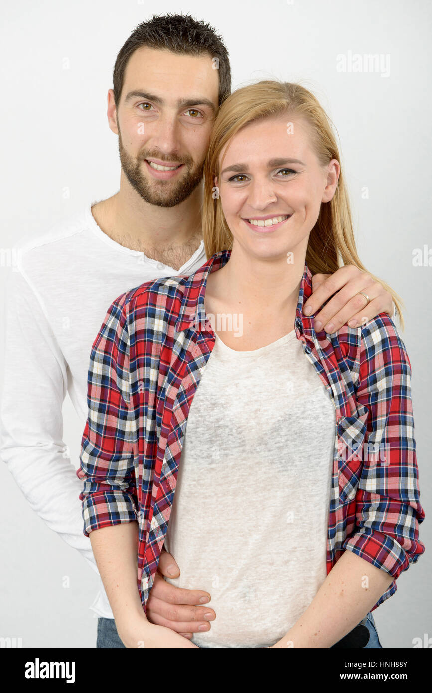 a portrait of happy young couple Stock Photo - Alamy