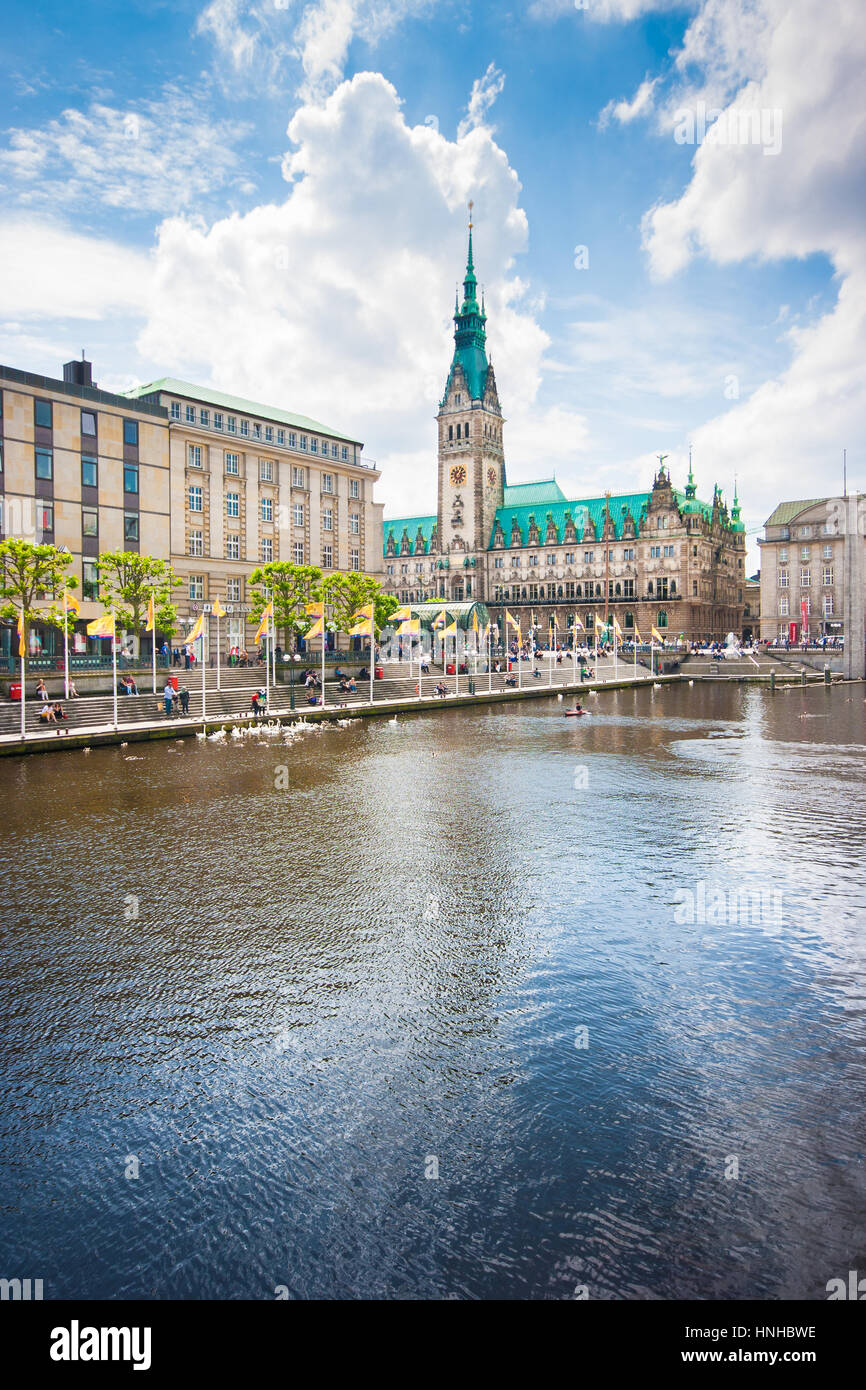 Beautiful view of historic Hamburg city center with famous town hall and scenic Kleine Alster river on a sunny day with blue sky and clouds in summer Stock Photo