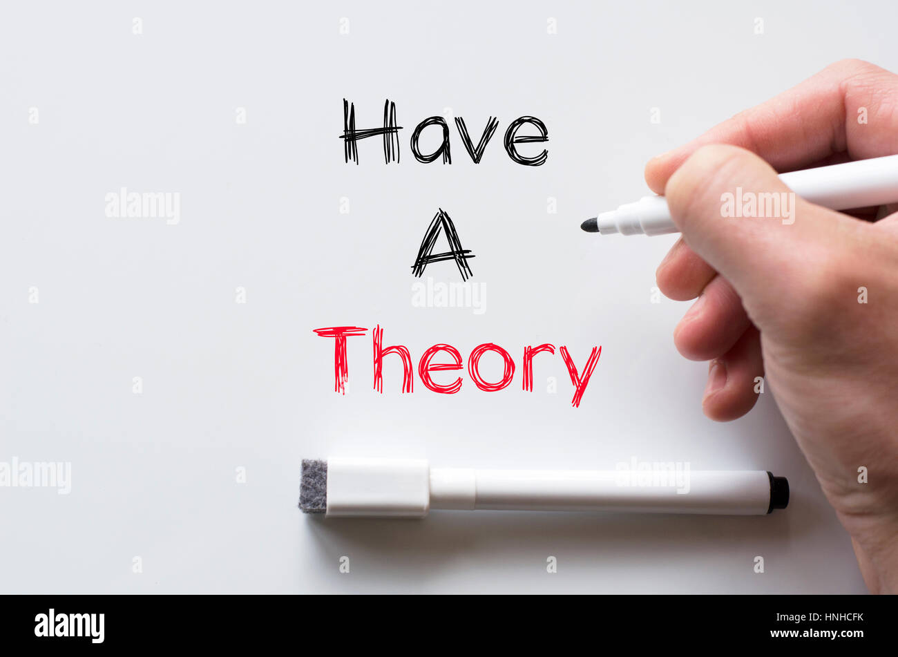 Human hand writing have a theory on whiteboard Stock Photo - Alamy