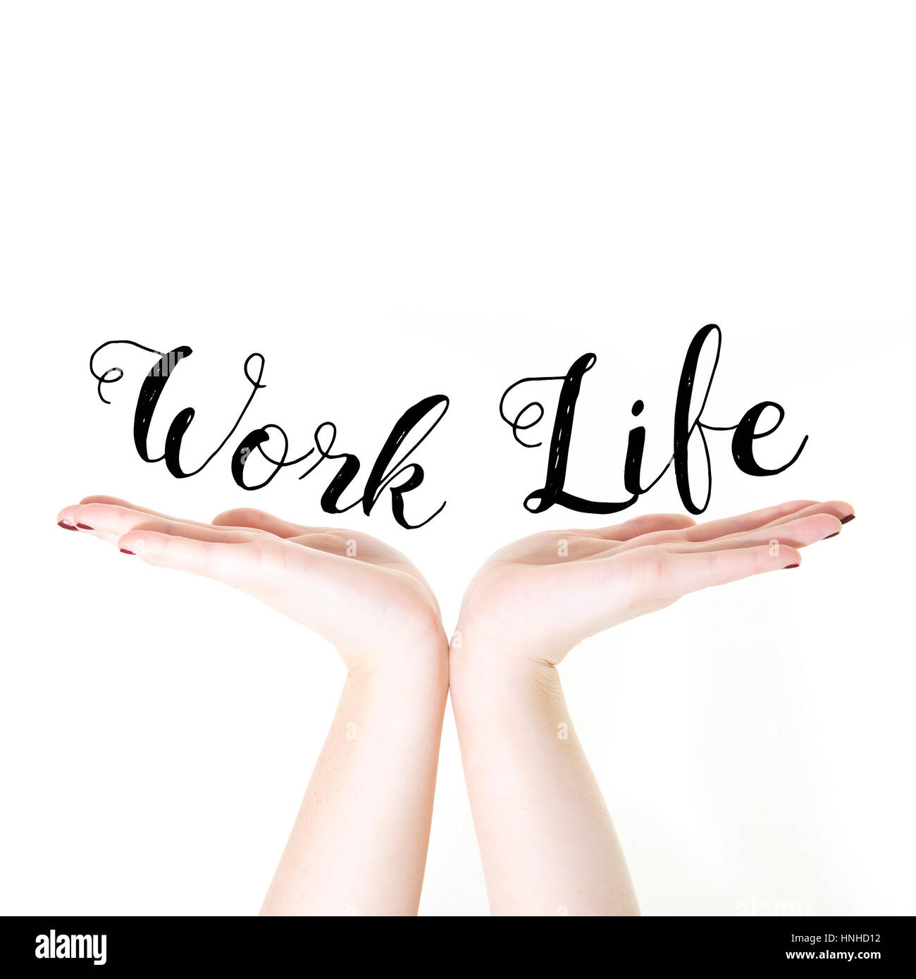 Hands holding the words Work Life Balance on a white background Stock Photo