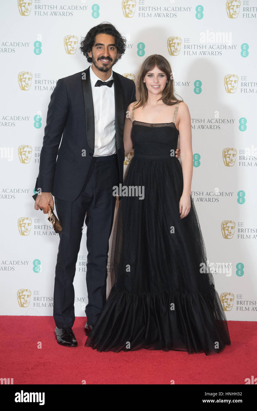 London, UK. 12th Feb, 2017. Actors Dev Patel and Felicity Jones pose in ...