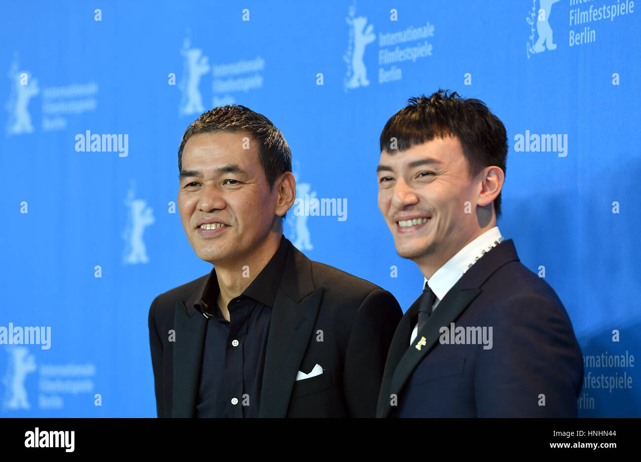 Berlin, Germany. 13th Feb, 2017. Actor Chang Chen (r) and director Sabu, photographed during the photo call for the movie 'Mr. Long' at the 67th International Berlin Film Festival in Berlin, Germany, 13 February 2017. The movie runs in competition. Photo: Jens Kalaene/dpa-Zentralbild/ZB/dpa/Alamy Live News Stock Photo