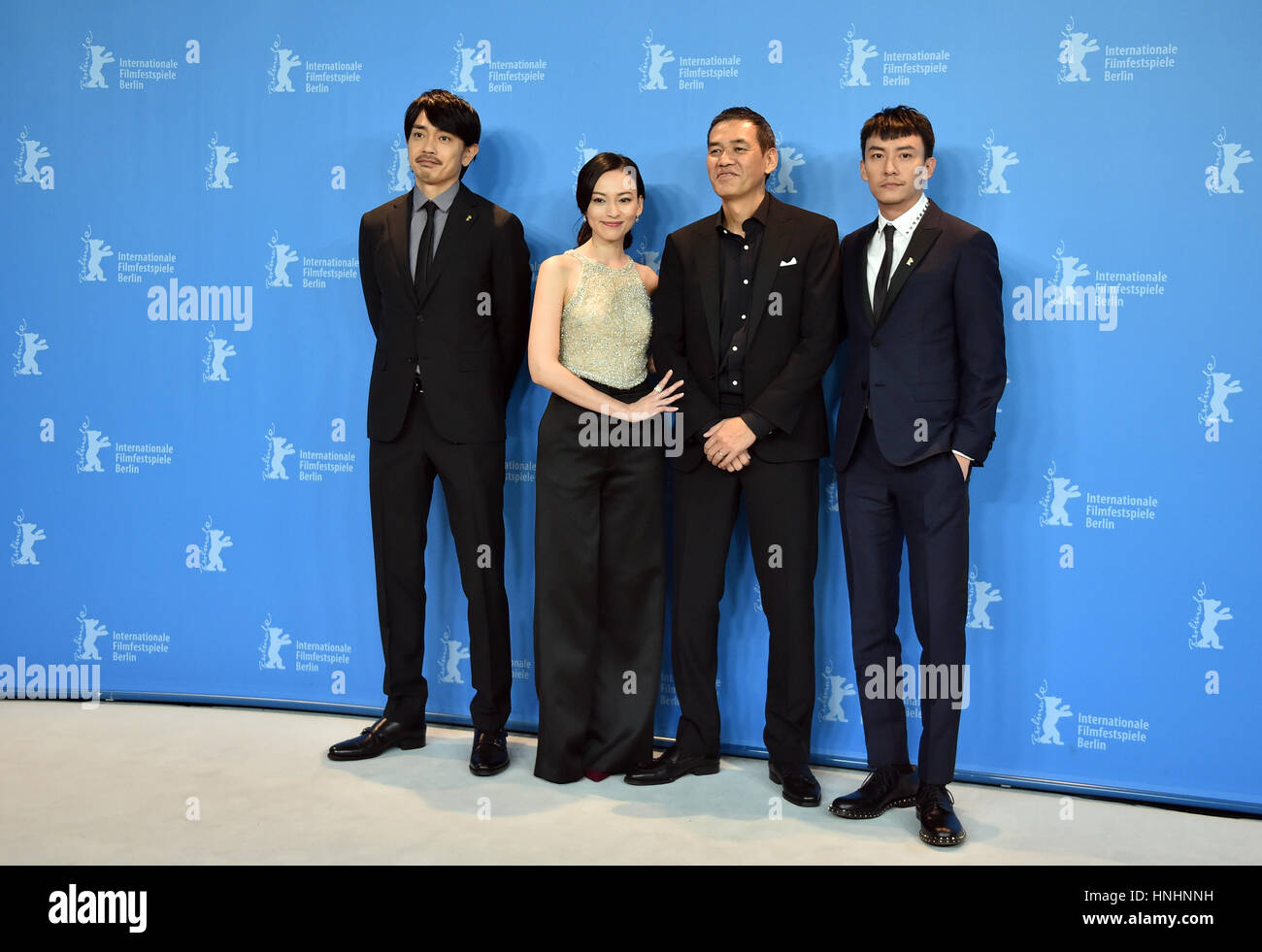 Berlin, Germany. 13th Feb, 2017. Actors Sho Aoyagi (l-r), Yao Yiti, director Sabu and actor Chang Chen, photographed during the photo call for the movie 'Mr. Long' at the 67th International Berlin Film Festival in Berlin, Germany, 13 February 2017. The movie runs in competition. Photo: Britta Pedersen/dpa-Zentralbild/ZB/dpa/Alamy Live News Stock Photo