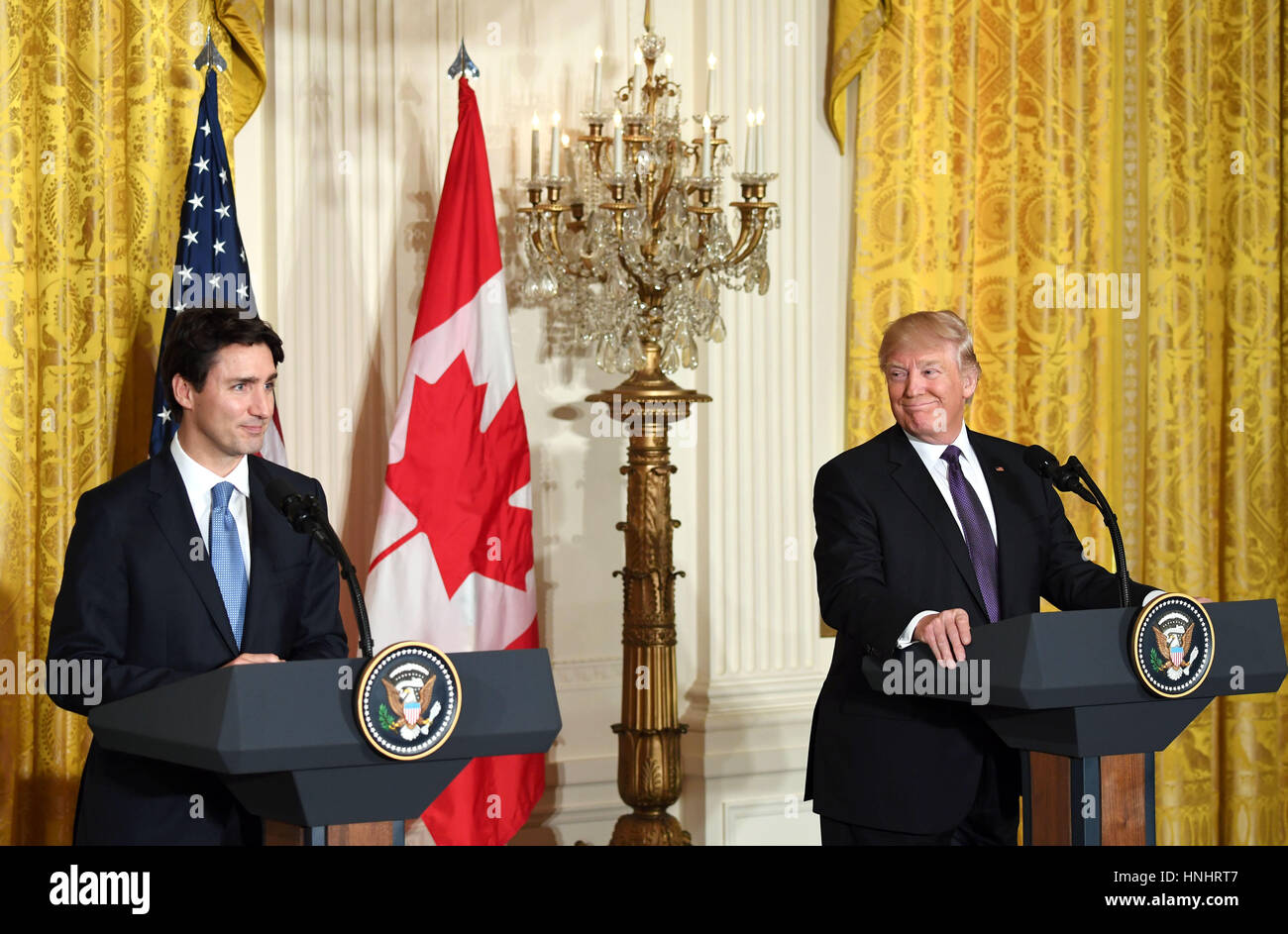 Washington, USA. 13th Feb, 2017. U.S. President Donald Trump (R) attends a joint press conference with visiting Canadian Prime Minister Justin Trudeau at the White House in Washington, DC, the United States, on Feb. 13, 2017. U.S. President Donald Trump on Monday vowed to deal with Democratic People's Republic of Korea (DPRK) 'very strongly', calling the Asian country a 'big, big problem.' Credit: Yin Bogu/Xinhua/Alamy Live News Stock Photo