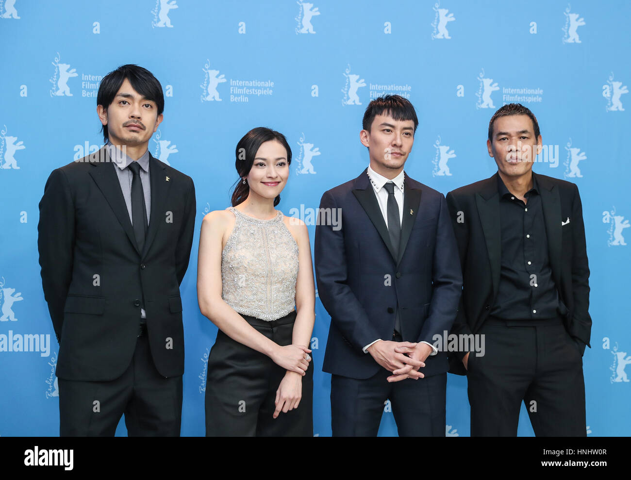 Berlin, Germany. 13th Feb, 2017. (From R to L) Director Sabu, actor Chang Chen, actress Yao Yiti and actor Sho Aoyagi attend a photocall of film 'Mr. Long' during the 67th Berlin International Film Festival in Berlin, capital of Germany, on Feb. 13, 2017. Credit: Shan Yuqi/Xinhua/Alamy Live News Stock Photo