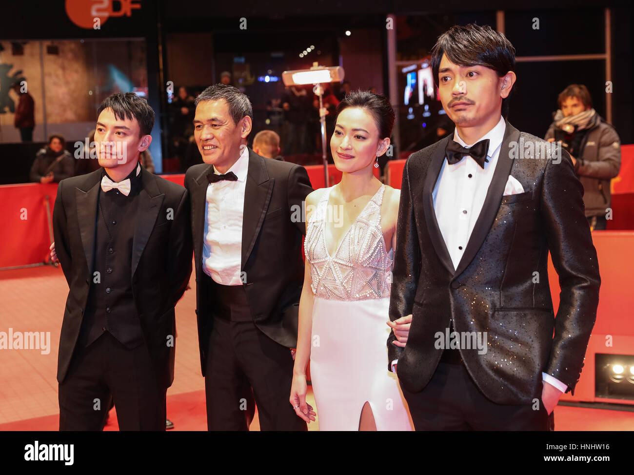 Berlin, Germany. 13th Feb, 2017. Director Sabu (2nd L), actor Chang Chen (1st L), actress Yao Yiti (2nd R) and actor Sho Aoyagi pose for photos on the red carpet for the premiere of film 'Mr. Long' during the 67th Berlin International Film Festival in Berlin, capital of Germany, on Feb. 13, 2017. Credit: Shan Yuqi/Xinhua/Alamy Live News Stock Photo