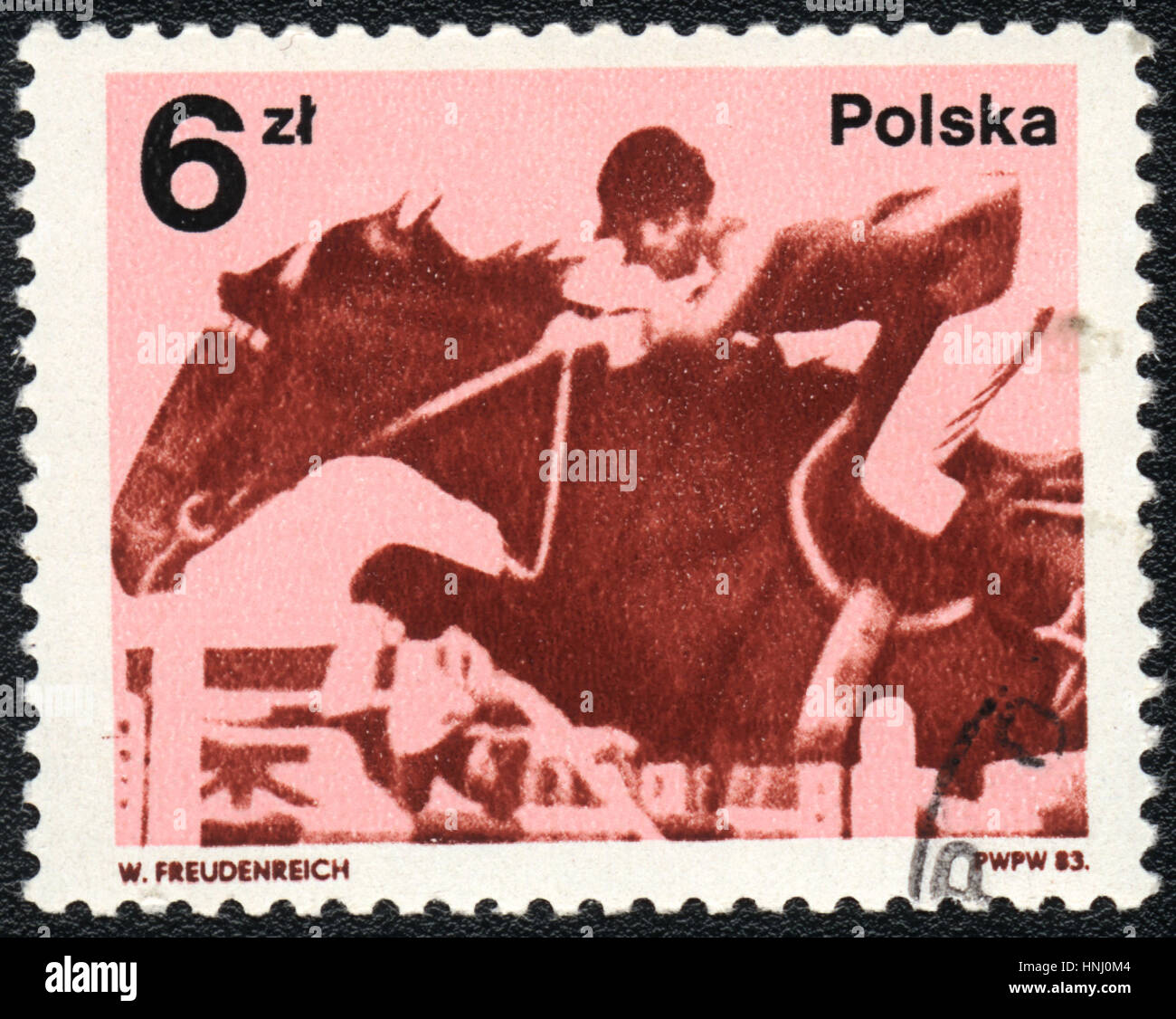 A postage stamp printed in Poland  shows a Show jumping,  equestrianism, 1983 Stock Photo