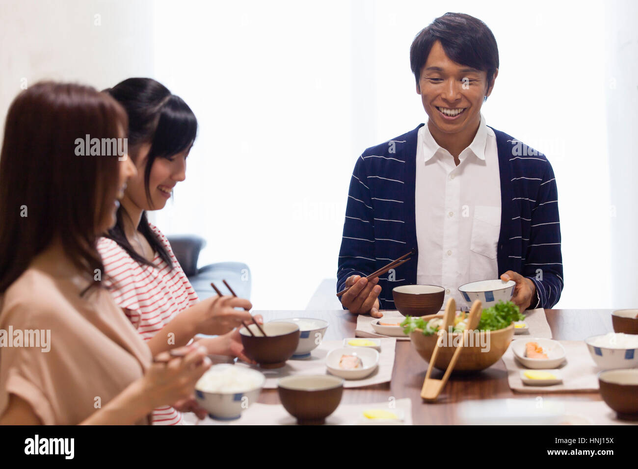 Family round dining table hi-res stock photography and images - Alamy