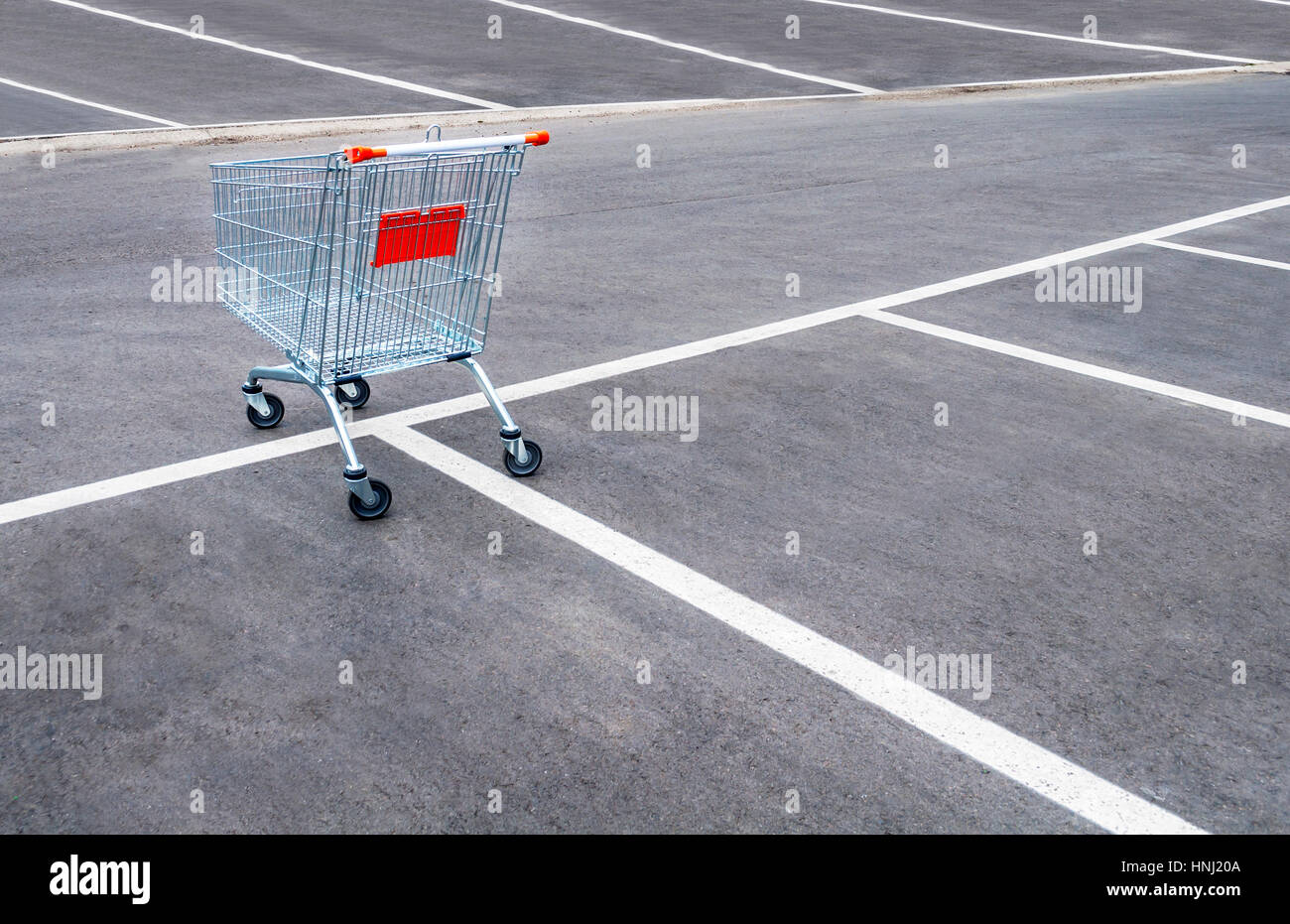 Shopping trolley on parking lot hires stock photography and images Alamy