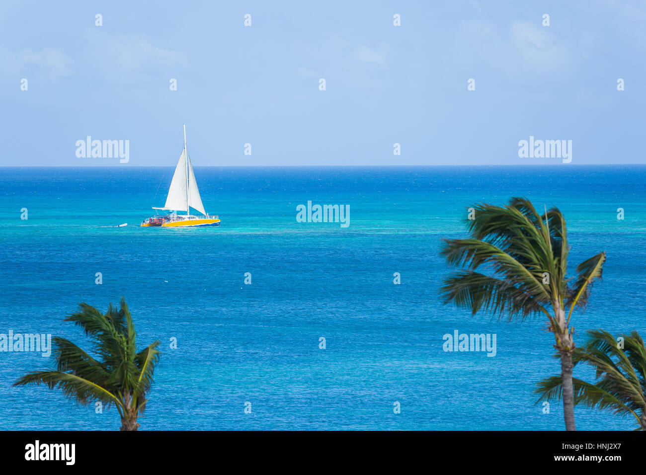 Catamaran at the tropical beach of Cuba Stock Photo