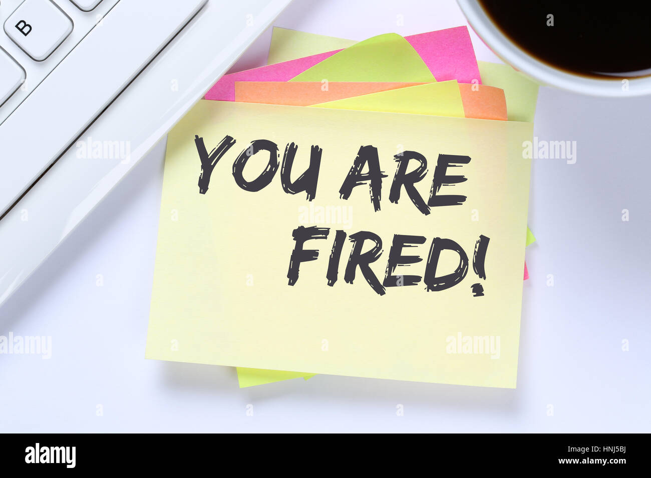 You are fired employee losing jobs, job working unemployed business desk computer keyboard Stock Photo