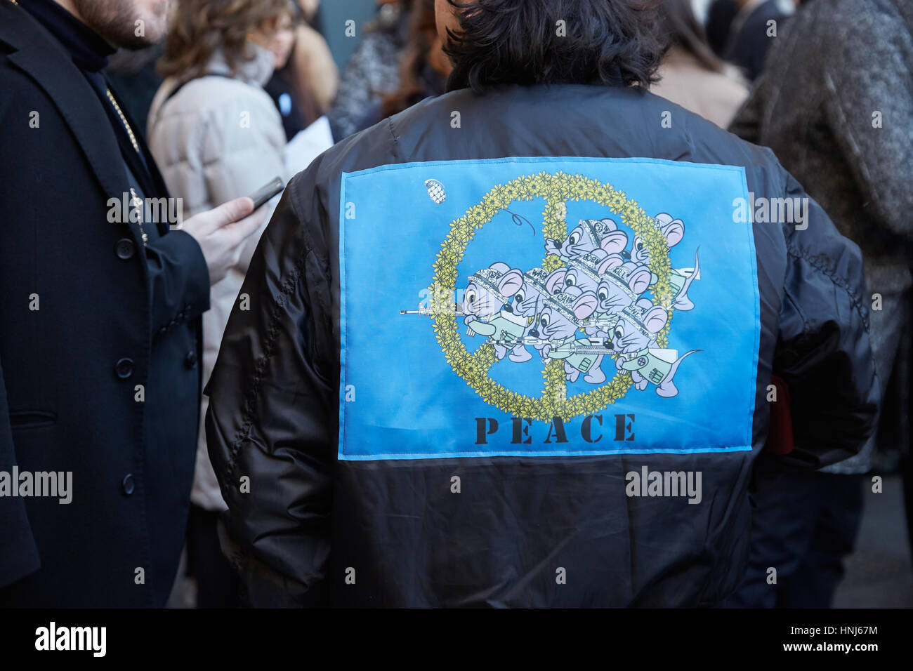 MILAN - JANUARY 14: Man with Alpha Industries blue bomber jacket and red Louis  Vuitton Supreme pouch before MSGM fashion show, Milan Fashion Week stre  Stock Photo - Alamy