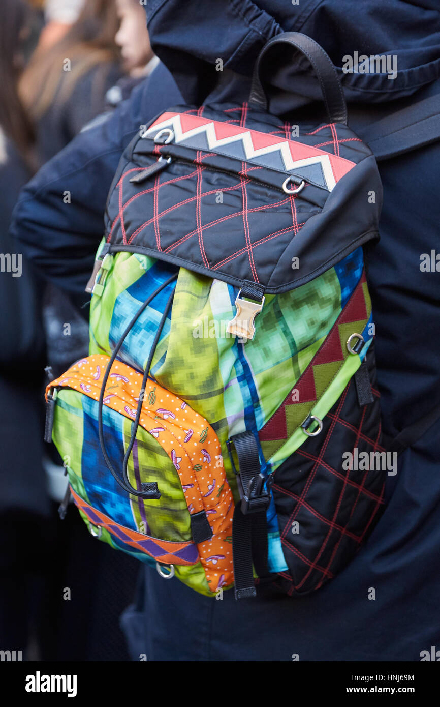 MILAN - JANUARY 16: Man with colorful Prada backpack before Wood Wood  fashion show, Milan Fashion Week street style on January 16, 2017 in Milan  Stock Photo - Alamy