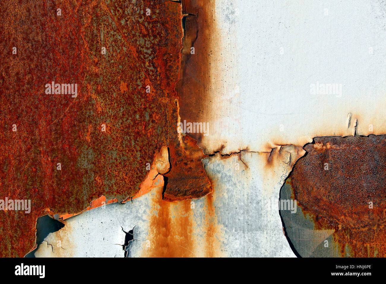 Rust on a metallic door surface Stock Photo