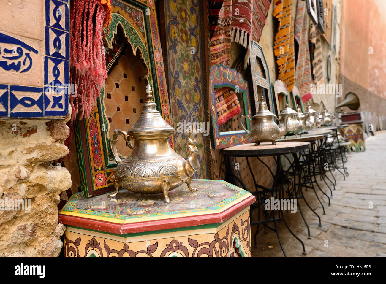 Decorative elements on the souk (market) in the old town, Medina in Morocco. Jug for brewing the tea. Stock Photo